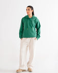 Relaxed-fit green hoodie, combining functionality and style with a comfortable and timeless design.