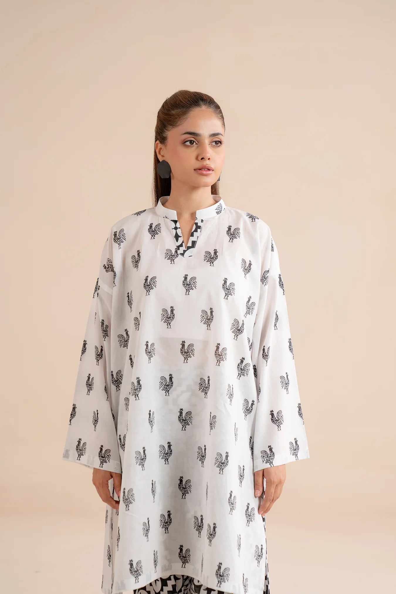 Shop 1 piece white lawn shirt black printed - monochrome Pakistani women kurta with bird motifs