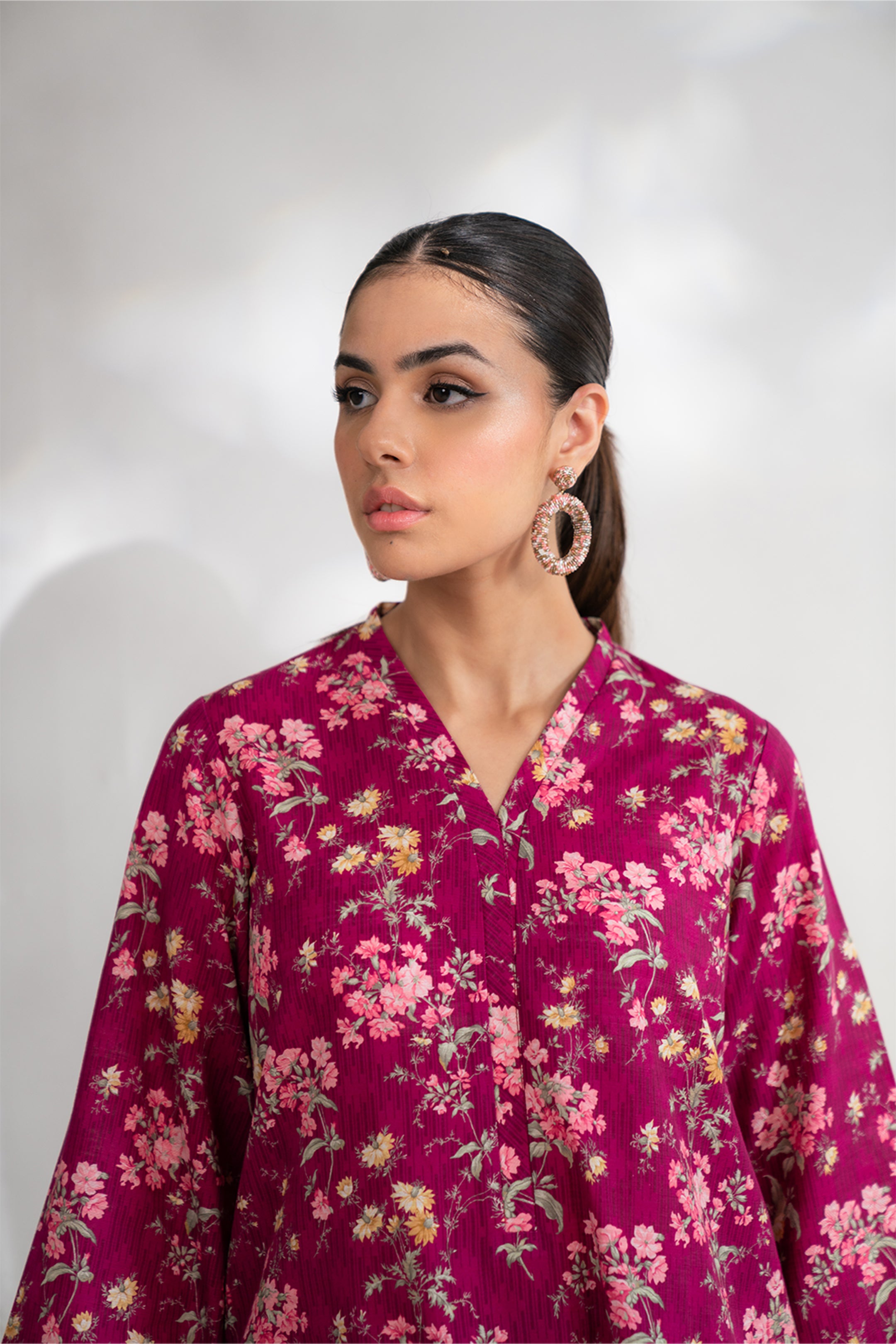 Shop 2-Piece Pink Khaddar Suit – Chic Print and Perfect for Women’s Wardrobe