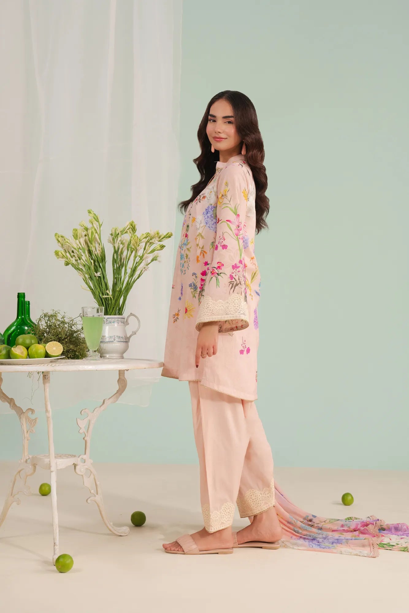 Shop Luxury peach unstitched lawn suit – embroidered organza border with digital printed shirt, dyed cambric trousers, and chiffon dupatta, summer collection Pakistan.