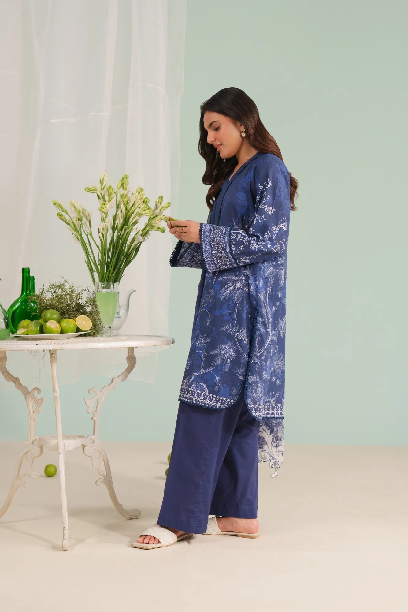 Shop ladies unstitched lawn suit online – blue digital printed shirt, dyed cambric trousers, and chiffon dupatta, perfect for casual and festive wear.