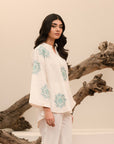 Shop online 1-piece embroidered khaddar shirt in off-white for a classic winter look