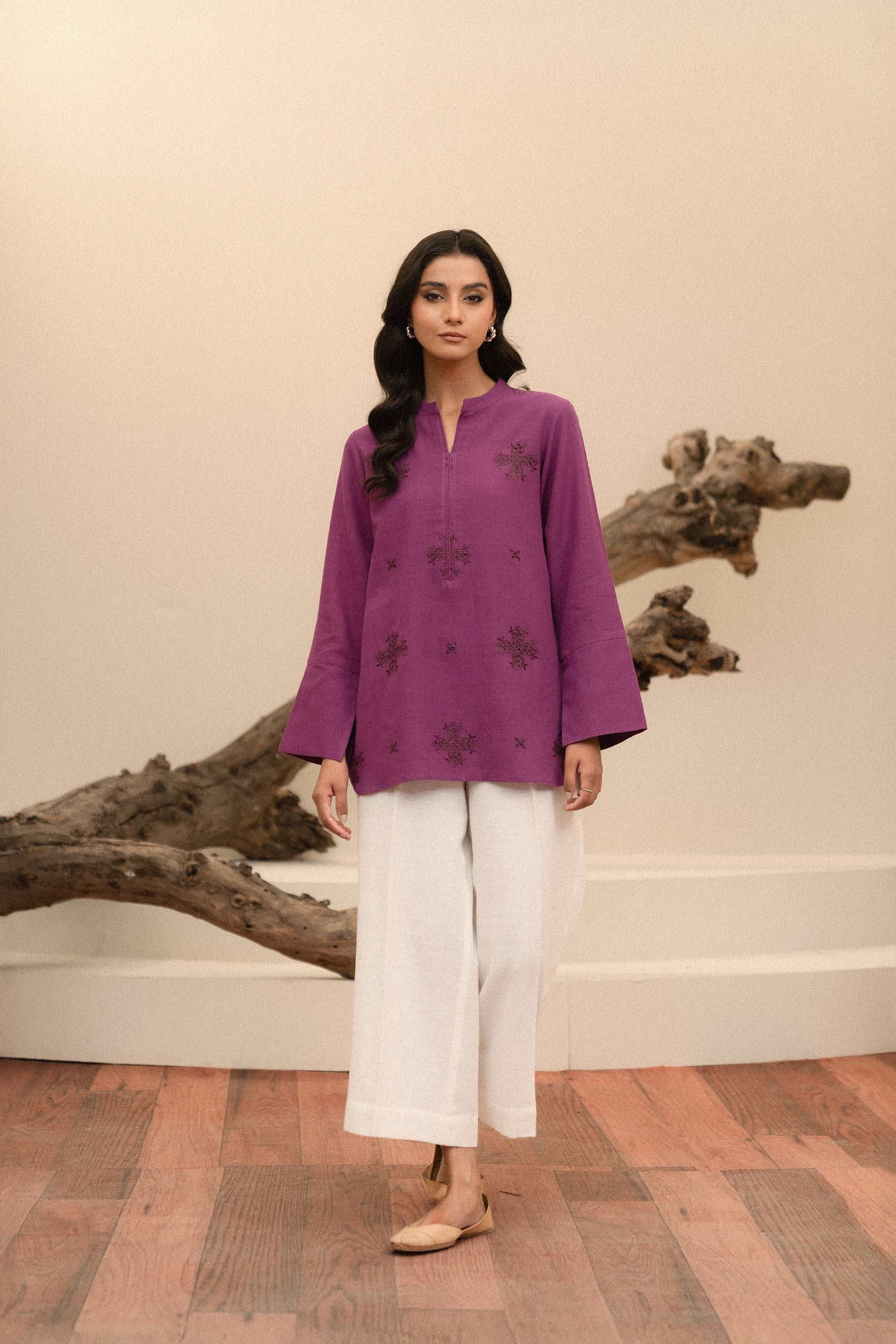 Shop online contemporary embroidered khaddar shirt for women, perfect for bold and youthful styling