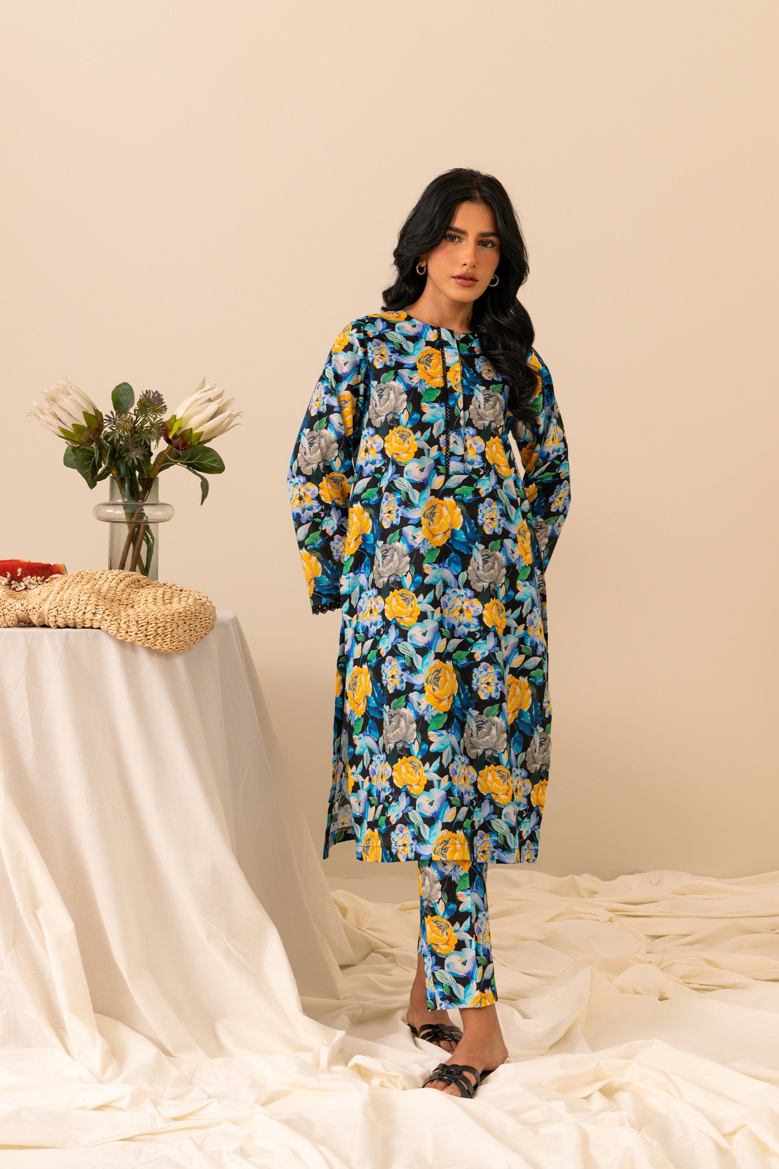 Shop online navy 2-piece printed cambric suit for women, featuring a vibrant yellow floral pattern