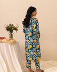 Shop women’s navy cambric shirt and straight trousers online, adorned with bold floral patterns
