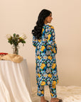 Shop women’s navy cambric shirt and straight trousers online, adorned with bold floral patterns