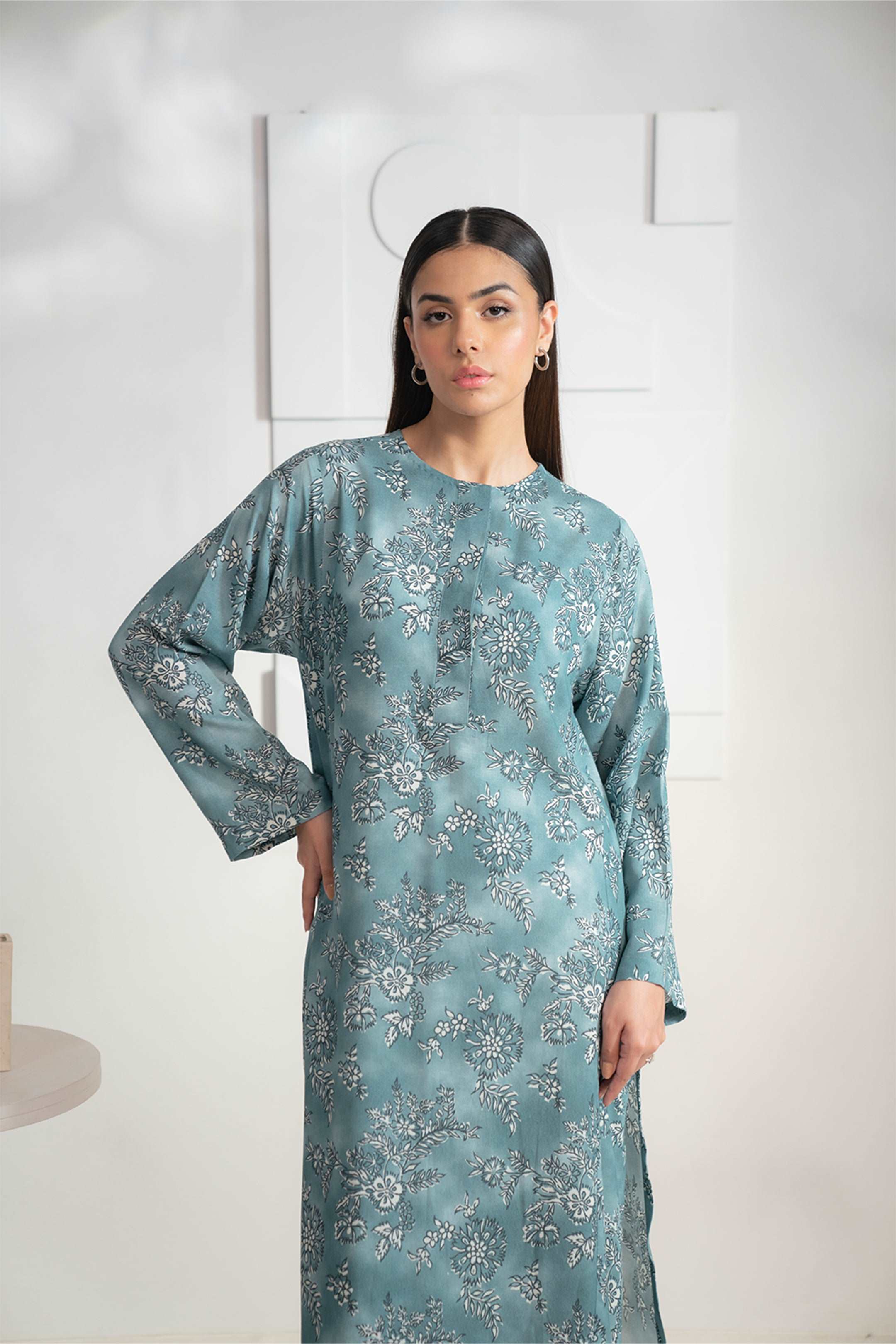Shop women’s printed Karandi shirt with teal and floral accents,  great for casual wear