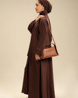 Side view of brown embroidered sleeve abaya – graceful modest silhouette Beyond East