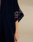Sleeve border detail on the velvet kaftan, showing embroidery placement and finishing.