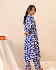 Stand out in a striking blue and white printed cambric shirt and trouser set