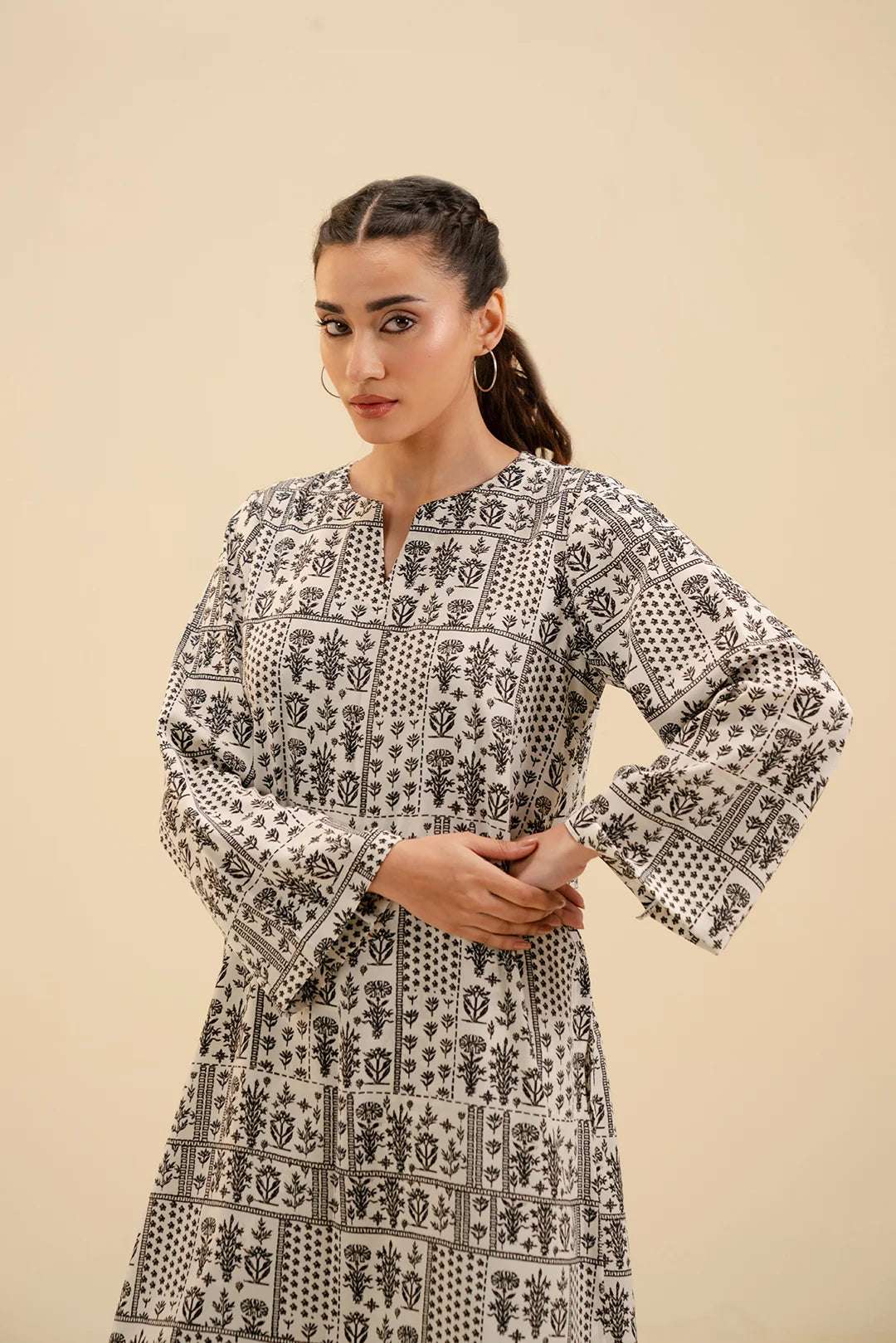 Stylish 2 piece georgette outfit – modern black and white printed shirt with matching trousers.