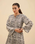 Stylish 2 piece georgette outfit – modern black and white printed shirt with matching trousers.