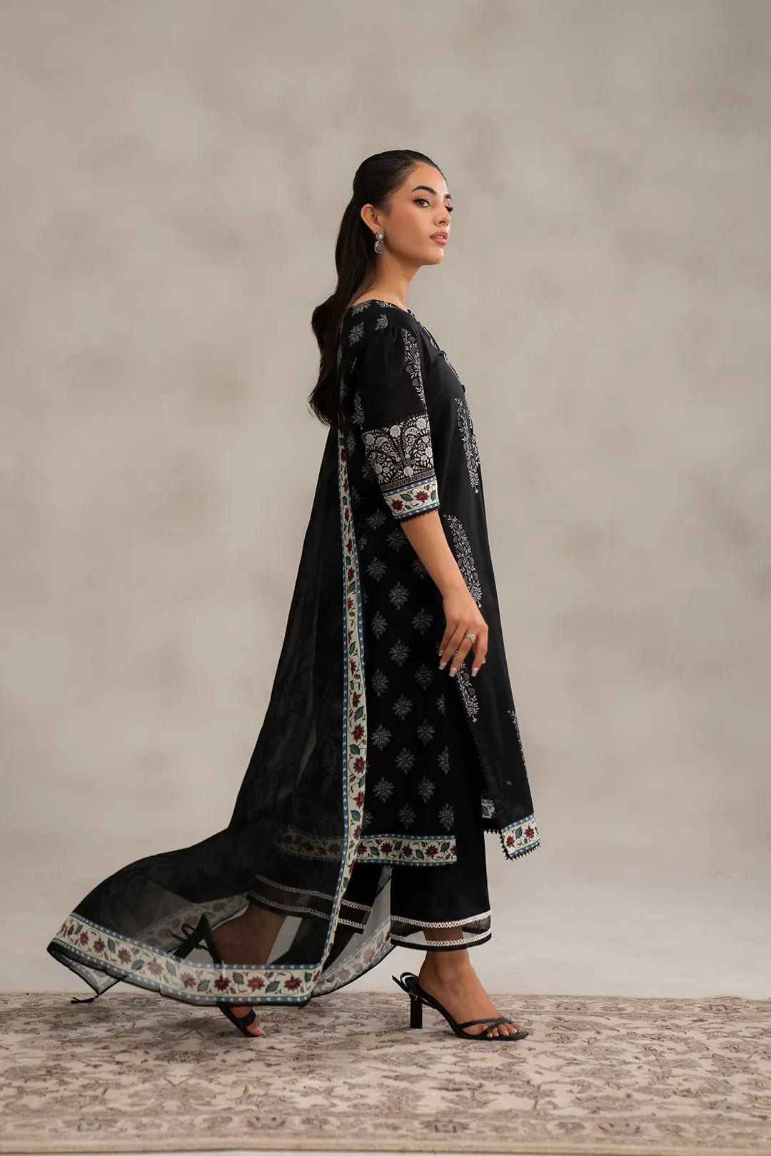Stylish black digital printed unstitched lawn suit for women – includes printed chiffon dupatta and shirt pieces, perfect summer lawn collection Pakistan & UK.