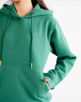Stylish green hoodie with long sleeves, designed for comfort and versatility in any casual outfit.