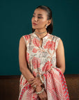 Stylish lawn suits for women – a printed off-white three-piece outfit with a contrasting cherry red dupatta and a composed border for a striking contrast.