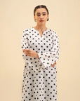 Stylish polka dot print cambric dress – modern fashion for every occasion.