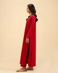 Stylish red kurta set for women – premium raw silk fabric for festive wear.
