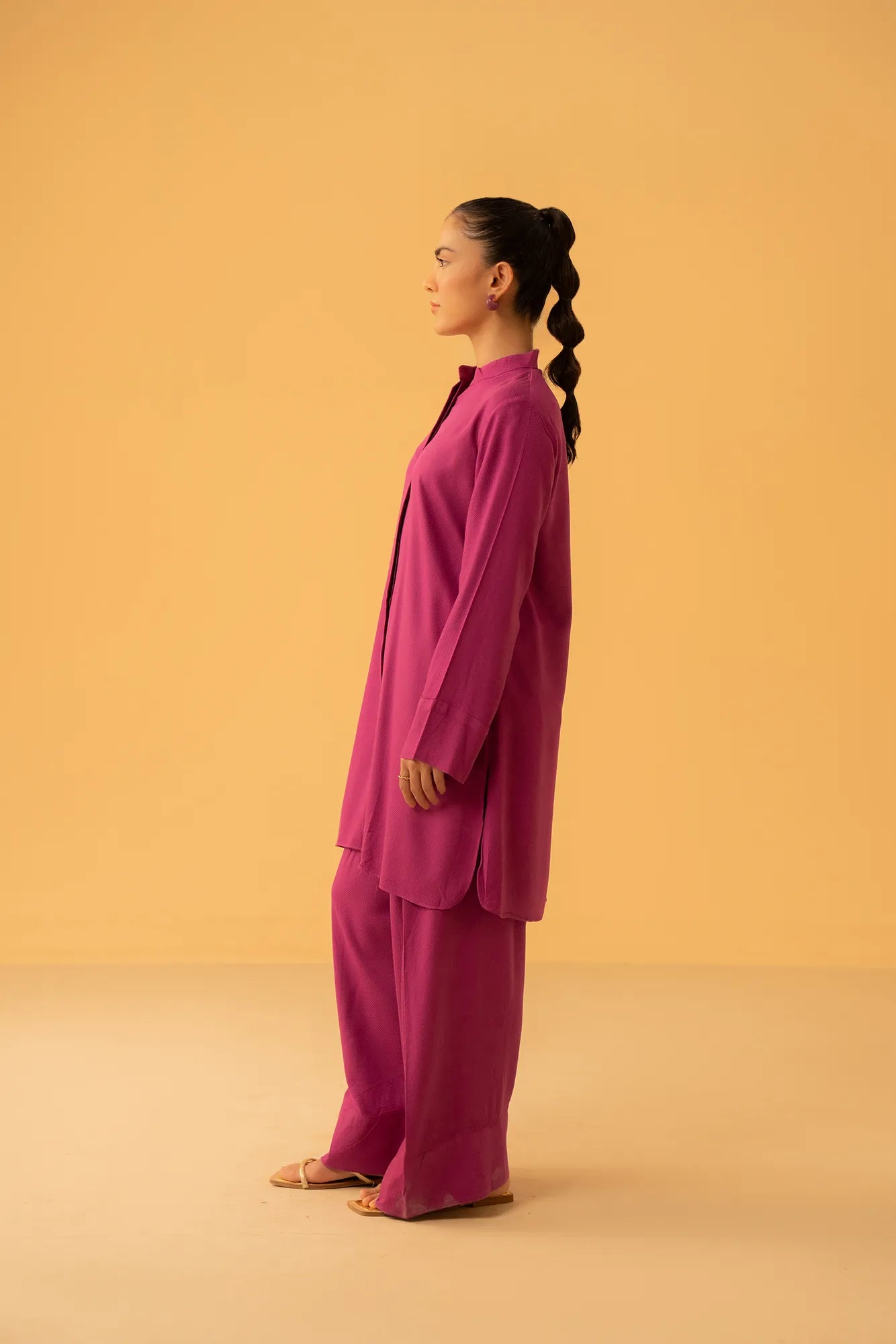 Stylish solid linen suit for women by clothing brand in Pakistan, available in Lahore