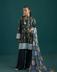 Stylish three piece lawn suit featuring a black floral-printed shirt, matching dyed cambric trouser, and a chiffon dupatta with modern abstract prints – perfect for summer fashion.