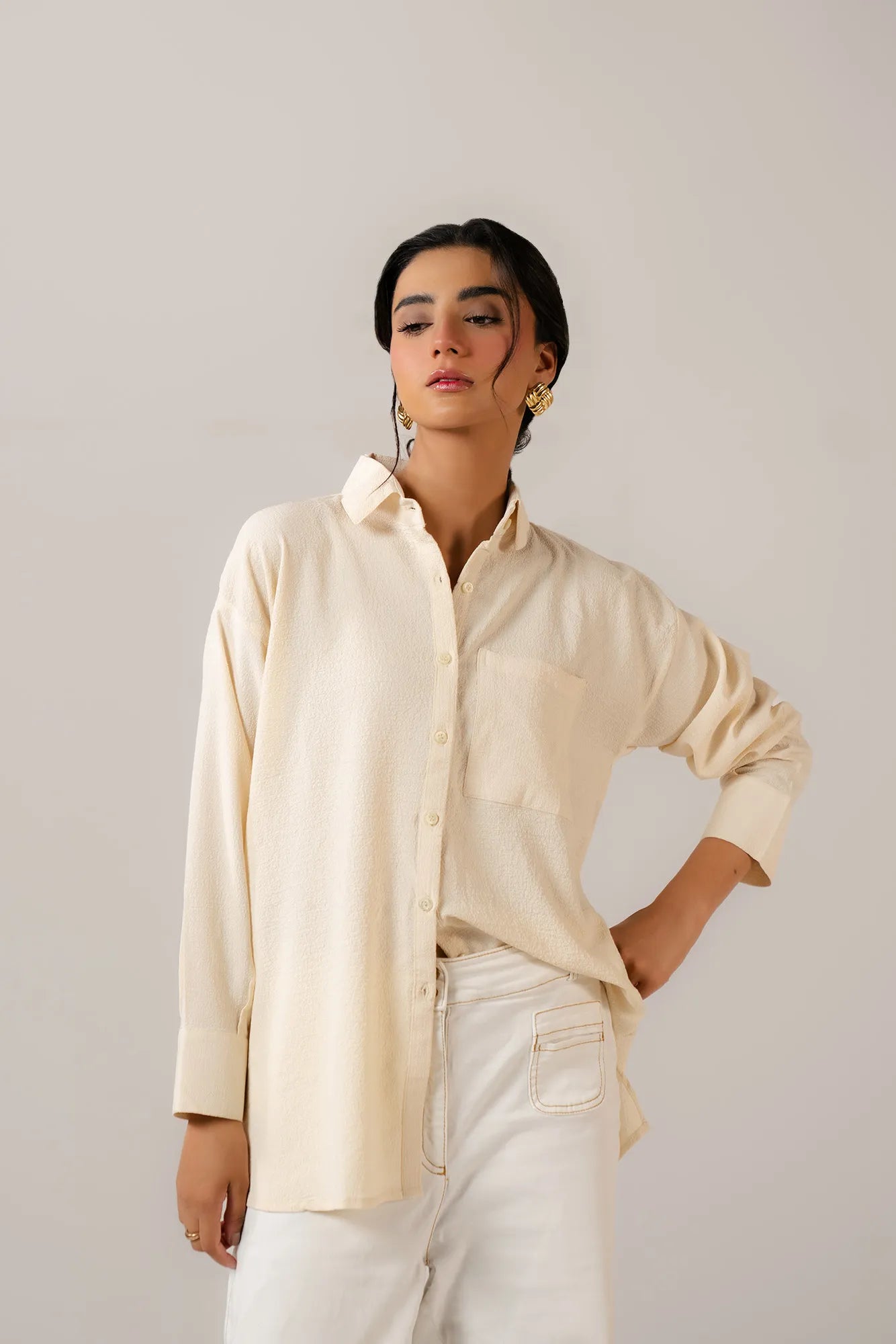 Stylish women western shirt in cream white with long sleeves and collar