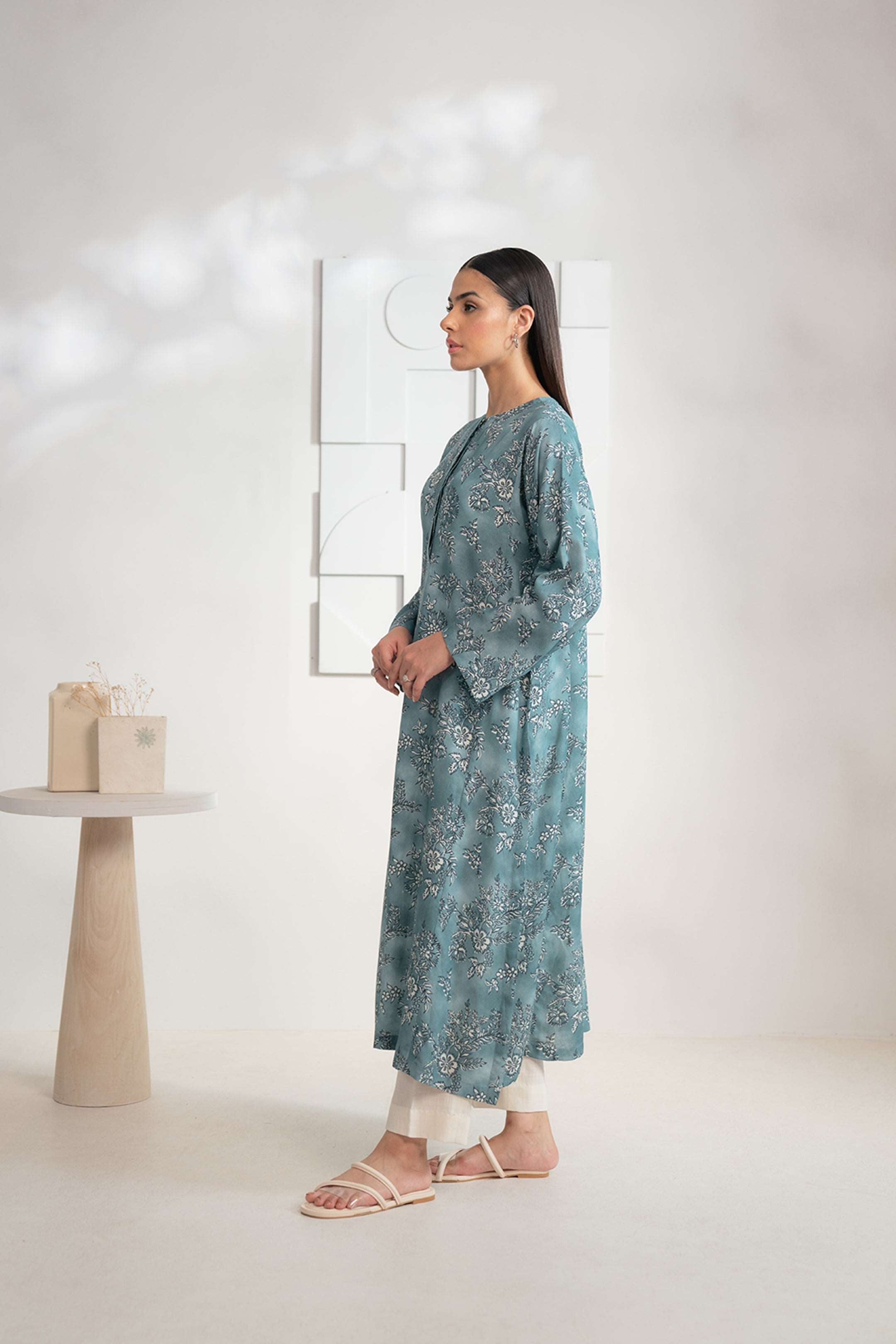 Teal Karandi shirt with floral prints, a perfect choice for ladies to shop online today
