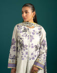 Trendy 3 piece lawn suit in Pakistan – digitally printed lawn shirt with intricate floral motifs, cambric trousers, and a lightweight chiffon dupatta.