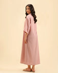 Trendy pastel pink dress with elbow-length sleeves – modern fashion style.