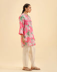 Trendy pink printed kurta for women – casual and chic Pakistani fashion.