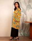 Trendy winter linen kurta for ladies – bold multicolor design on bright yellow base for a lively look.