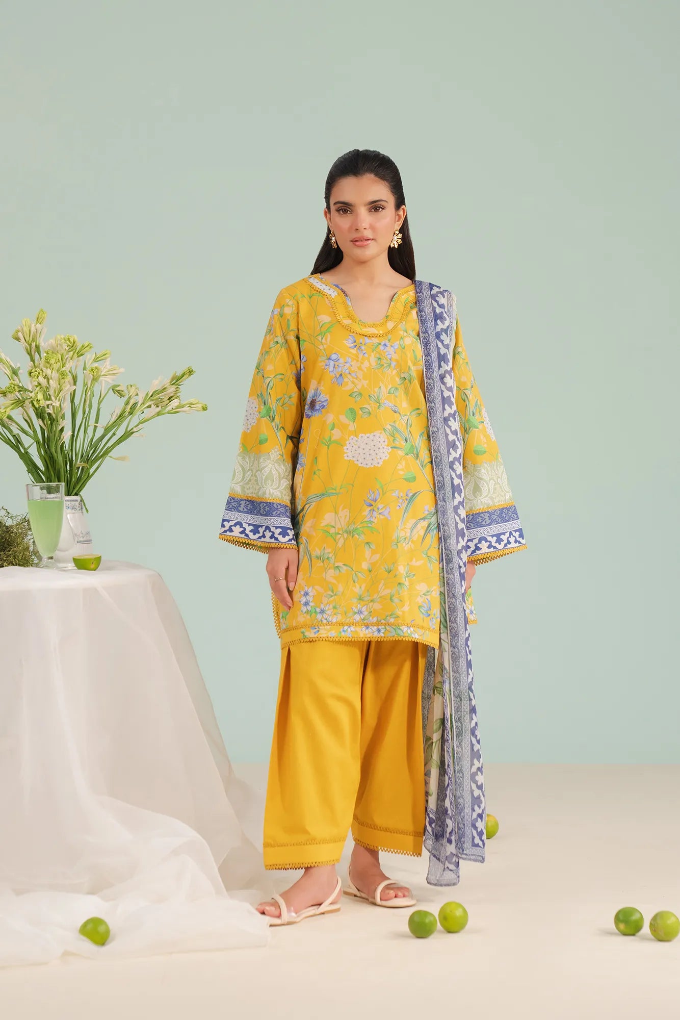 Unstitched 3 Piece Printed Lawn Suit in white and purple, perfect for women shopping designer unstitched suits in Sialkot’s Defence Road and Defence View Housing Scheme.