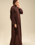 Woman wearing brown embroidered sleeve abaya – elegant everyday modest wear Pakistan