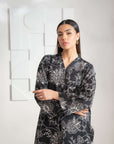 Women’s black and white Karandi shirt with a contemporary silhouette, available to shop online now