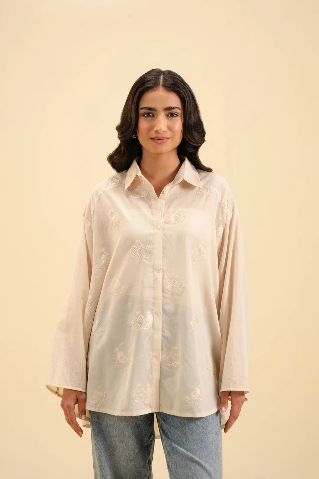 Women's embroidered cambric button-down shirt – casual and chic fashion choice.