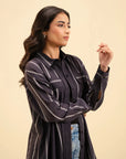 Women's longline collared shirt with flap pockets – perfect for casual styling.