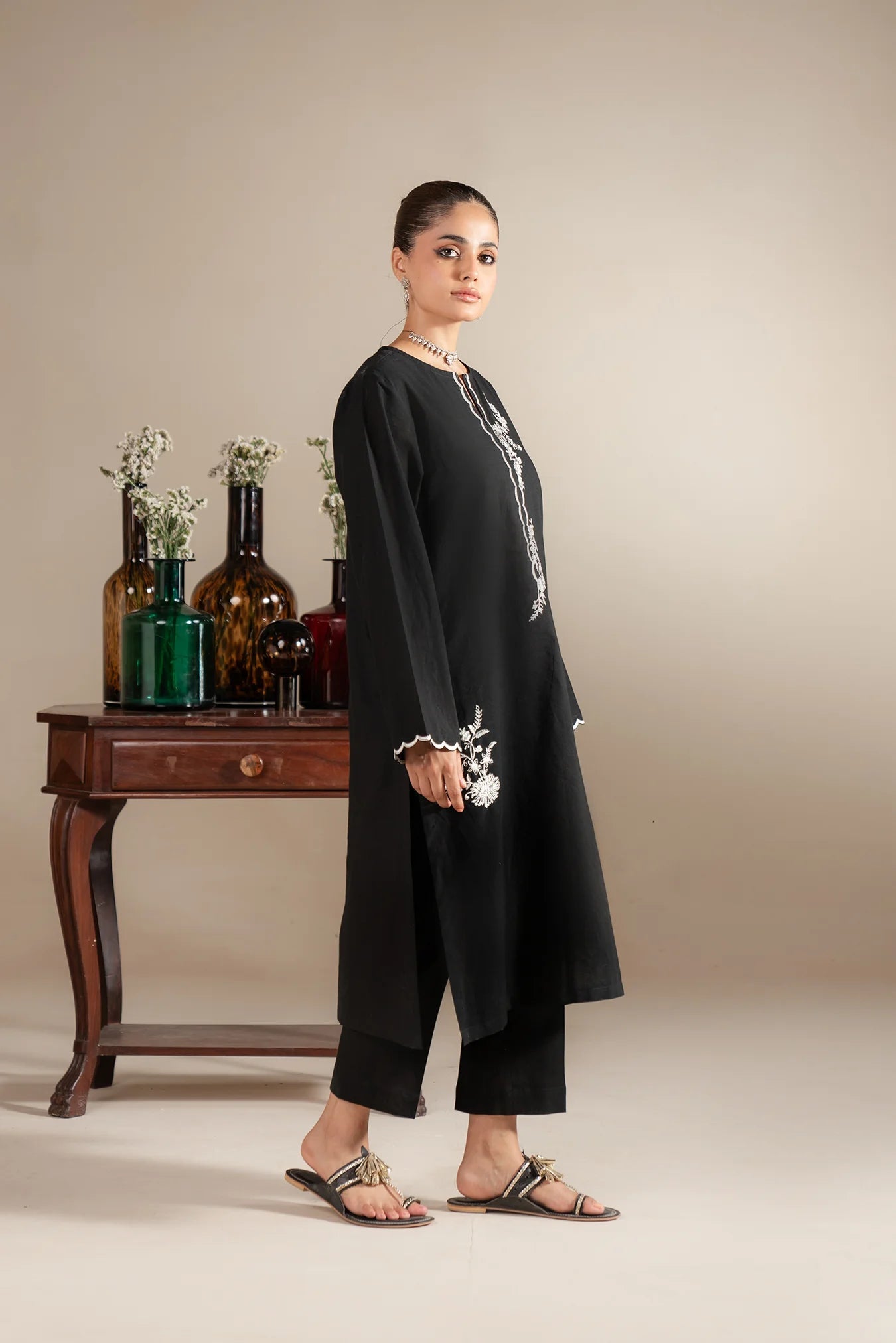 shop black lawn kameez with white embroidered design - premium Pakistani suit for women online