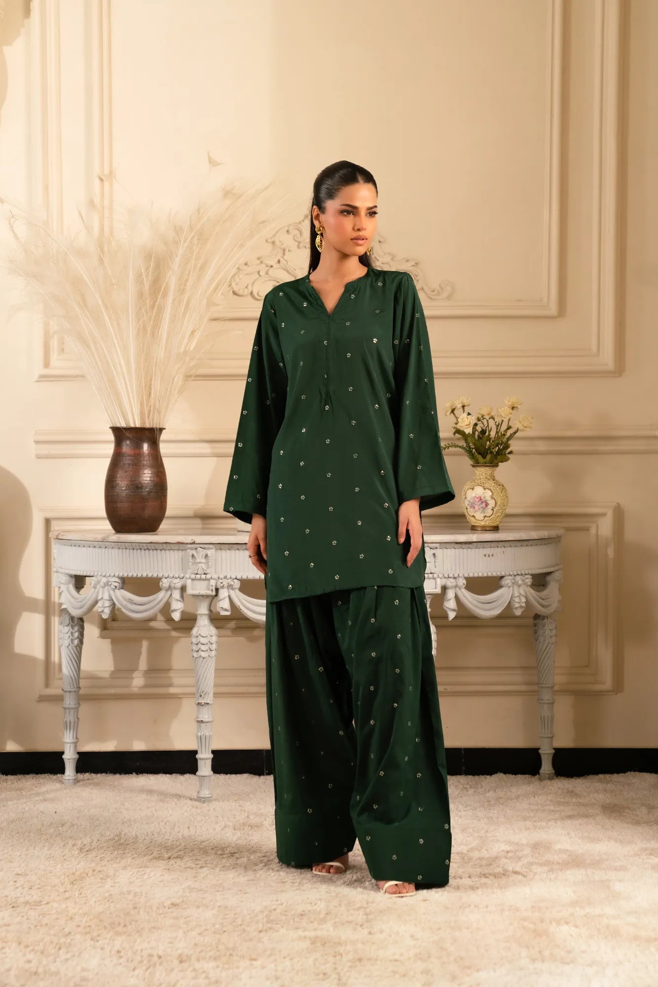 2 Piece Embroidered Raw Silk Suit design in dark green color for women in Pakistan