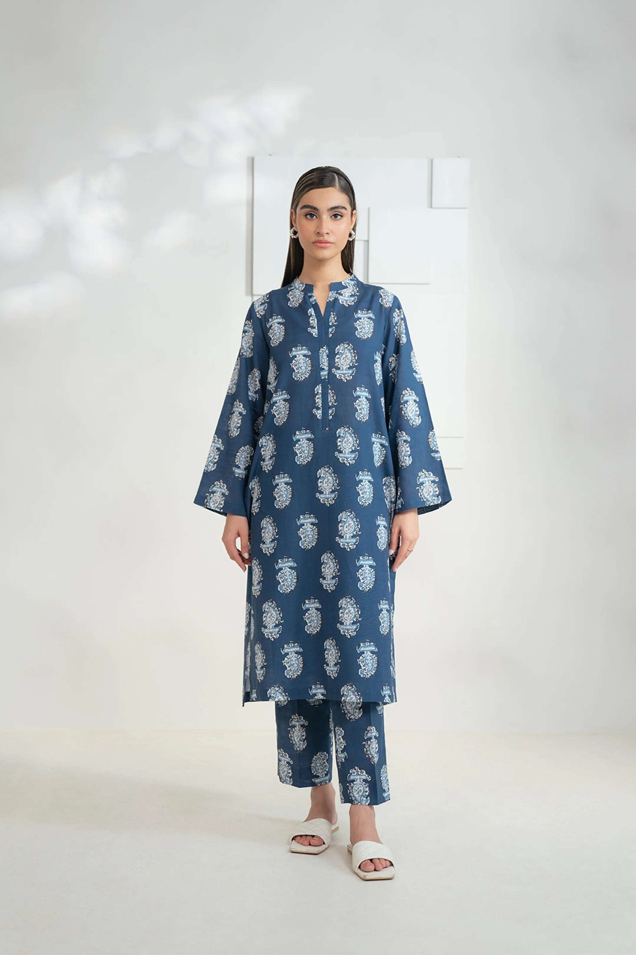 2 Piece printed khaddar suit Blue for women by Beyond East