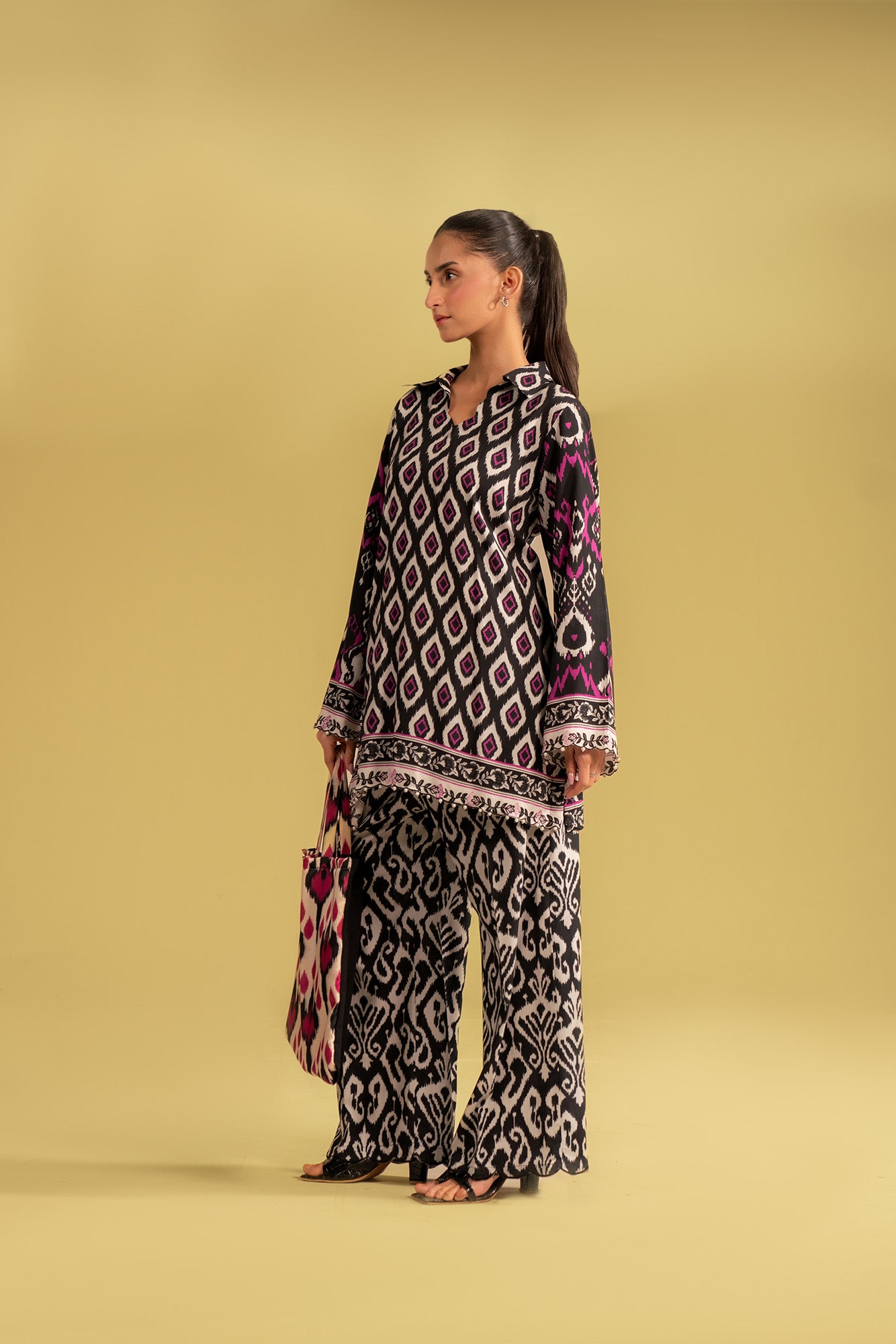 2 piece unstitched digital printed linen suit in black and white, featuring a modern floral and geometric pattern with pink accents