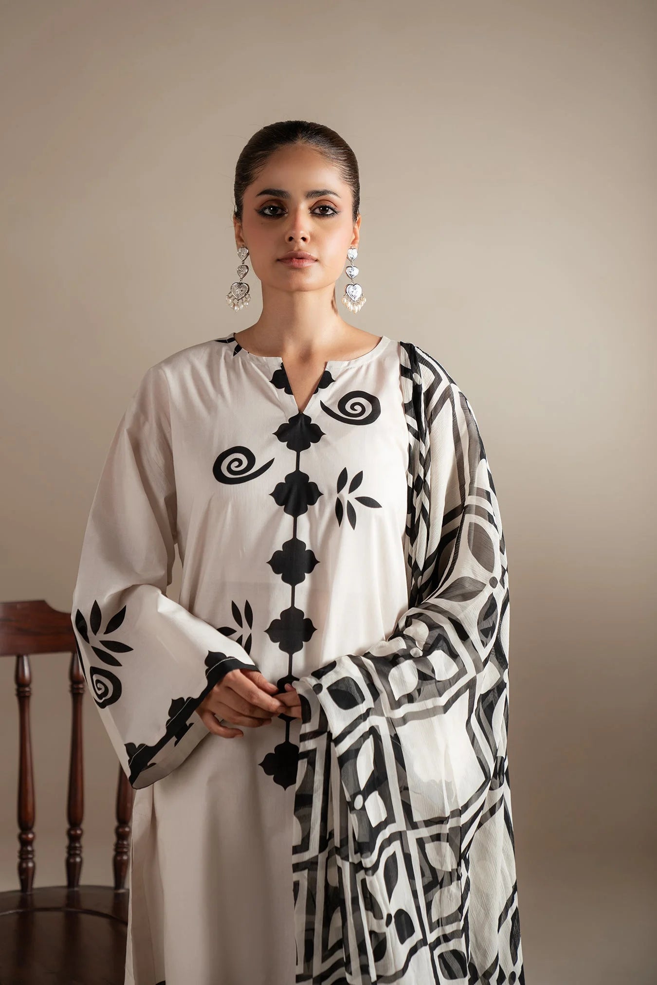 3_piece_stitched_pret_lawn_suit_for_women_in_modern_black_and_white_geometric_print_design.