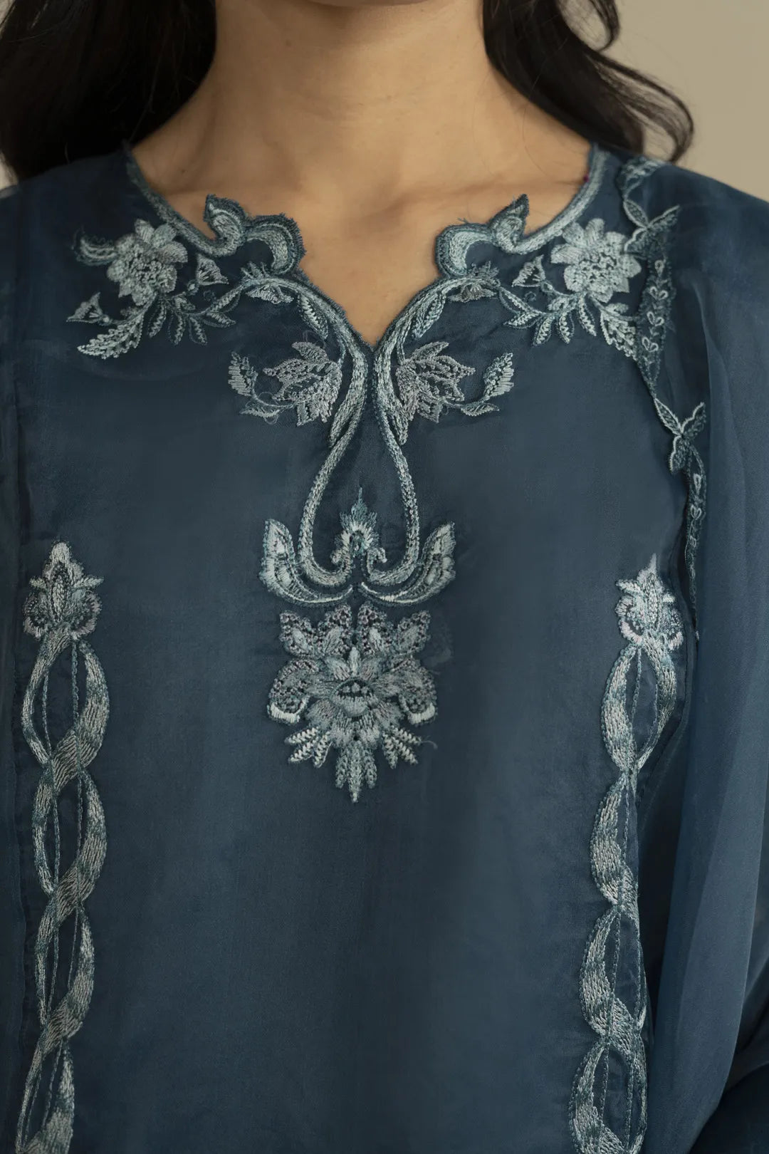 Airy organza drape with embroidered accents for party wear styling