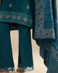 Back view of teal khaddar embroidered shirt with winter shawl