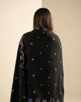 Back view of the shawl wrap showing length, fall, and overall silhouette.