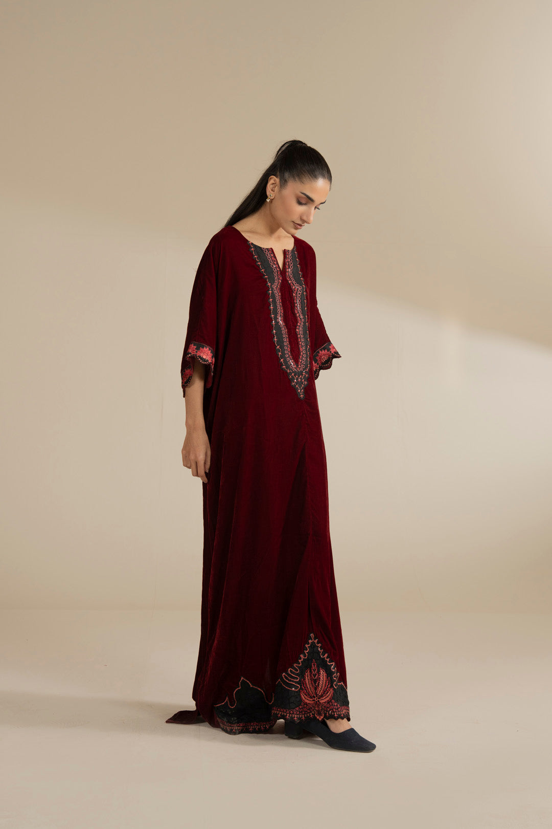 Back view showing overall length, flow, and how the velvet falls from shoulder to hem.