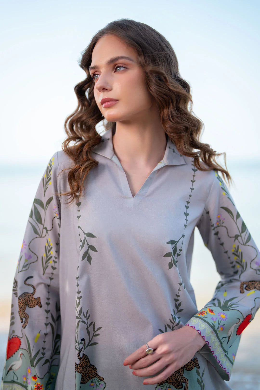 Beachside full-length view of grey printed co-ord set