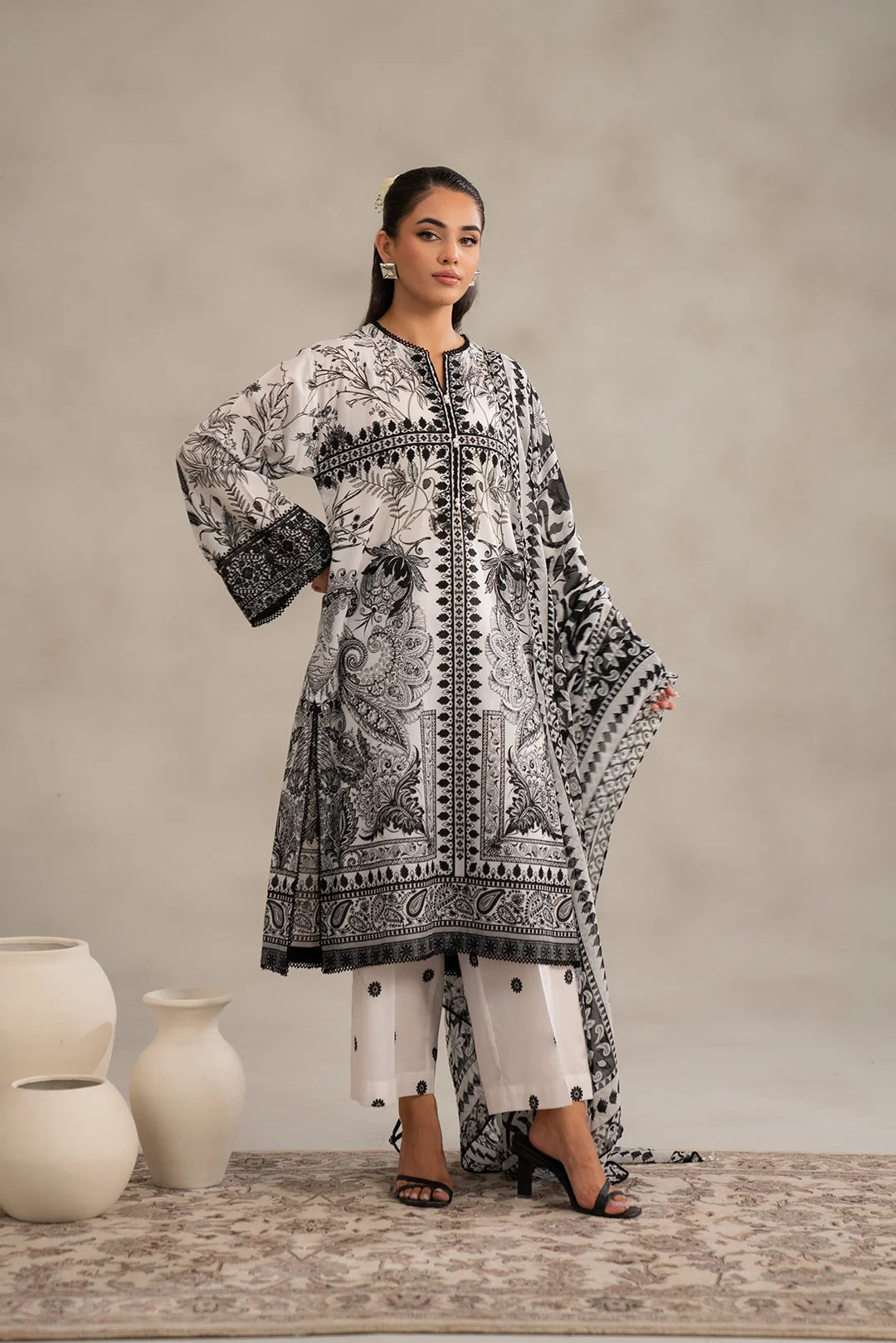 Black and white 2 piece printed lawn suit with chiffon dupatta and cambric trousers