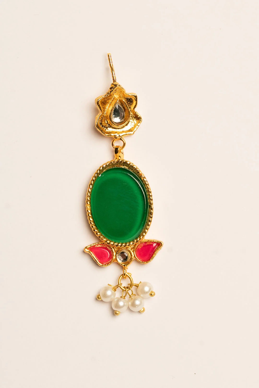 Bold green red drop earrings flatlay gold bezel setting Pakistani jewellery online women 2026