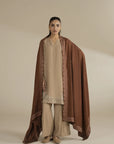 Brown yarn dyed embroidered shawl styled as a full drape over a neutral outfit, front view in studio.