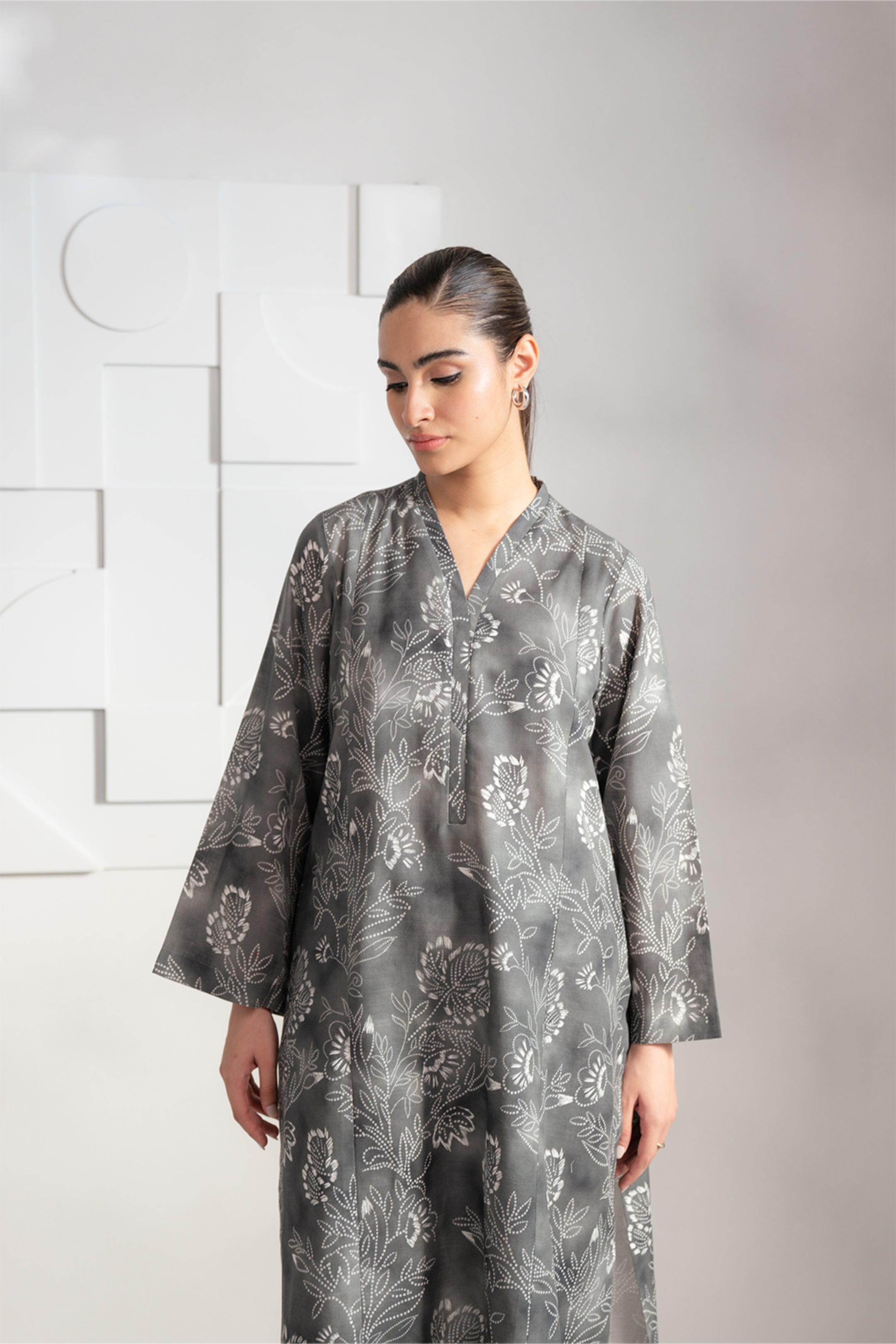 Buy 2-Piece Charcoal Khaddar Suit with Prints – Perfect for Women’s Wardrobe in Pakistan
