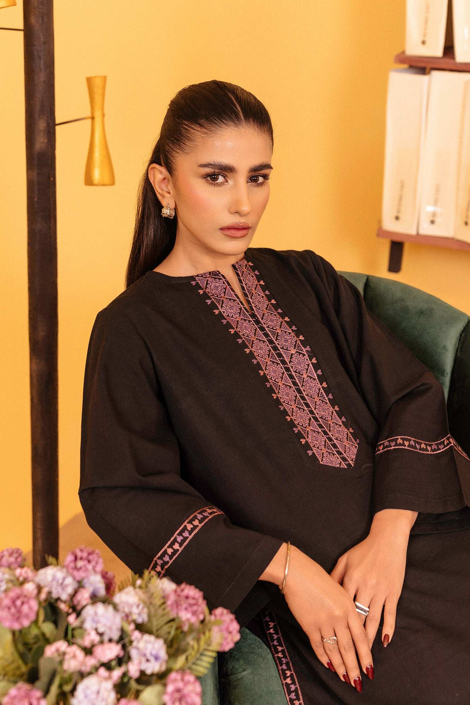 Buy Trendy 2-Piece Black Khaddar Suit with Intricate Embroidery
