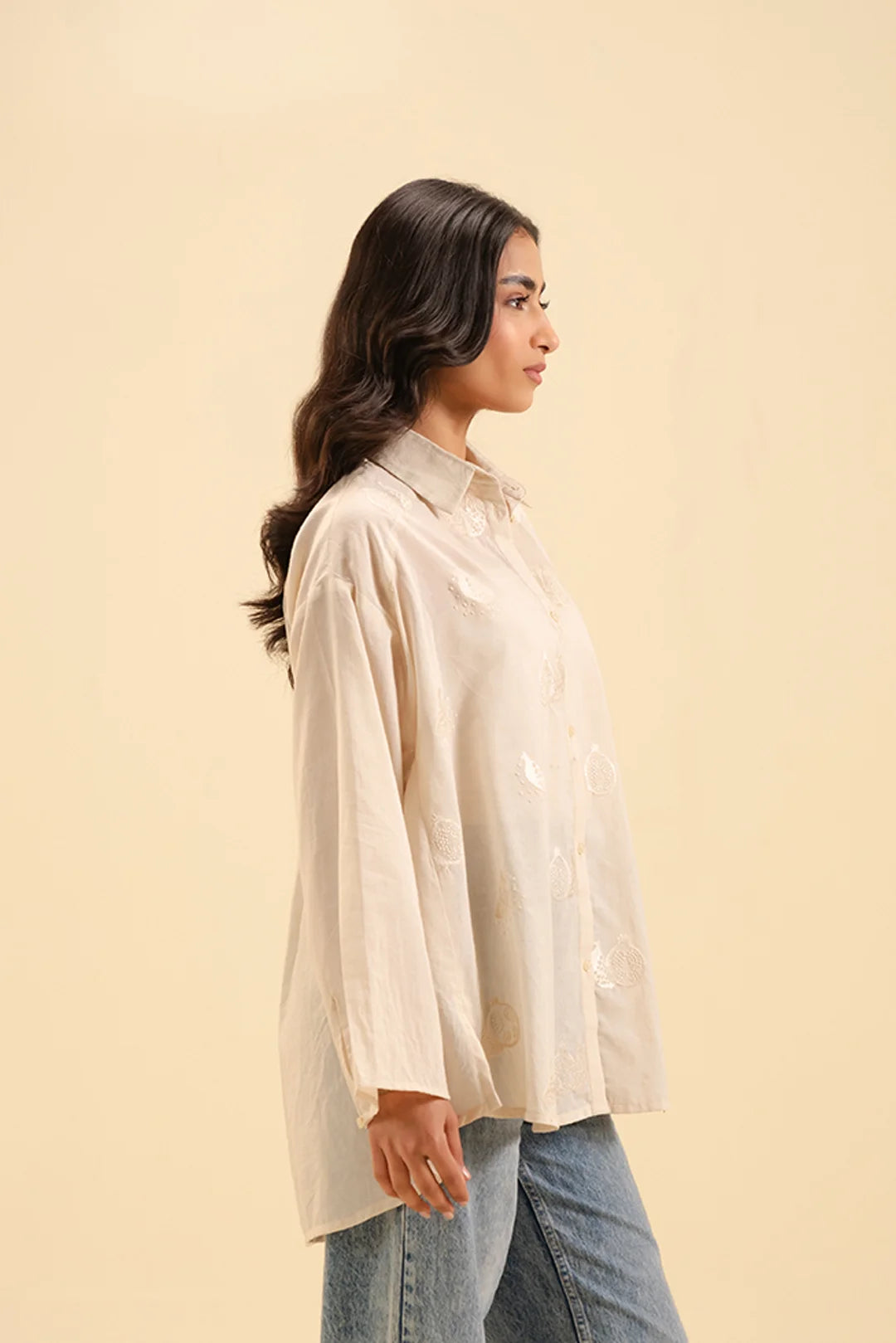 Buy beige cambric embroidered shirt for women – stylish and breathable fabric.